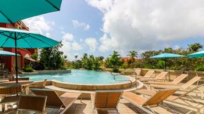 Outdoor pool, pool umbrellas, sun loungers