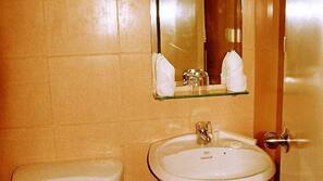 Shower, free toiletries, slippers
