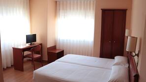 Desk, blackout curtains, free cots/infant beds, rollaway beds