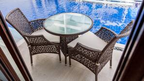 2 outdoor pools, open 8:00 AM to 10:00 PM, pool umbrellas, pool loungers