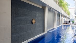2 outdoor pools, open 8:00 AM to 10:00 PM, pool umbrellas, pool loungers