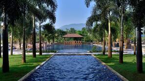 Outdoor pool, open 7:00 AM to 8:00 PM, free pool cabanas, pool umbrellas