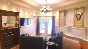 Flat-screen TV, fireplace