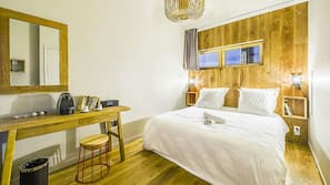 Premium bedding, blackout drapes, iron/ironing board, free WiFi
