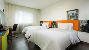 Roupas de cama premium, frigobar, cofres nos quartos