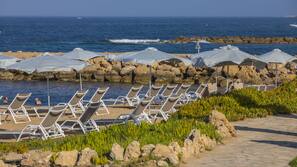 Beach nearby, sun loungers, beach umbrellas, beach bar