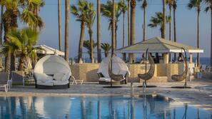 Indoor pool, outdoor pool, pool umbrellas, sun loungers