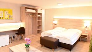 Premium bedding, blackout drapes, soundproofing, iron/ironing board