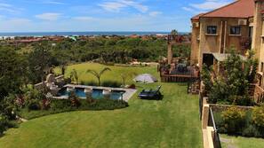 Outdoor pool, pool umbrellas, pool loungers