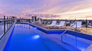 Outdoor pool, pool umbrellas, pool loungers