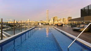 Outdoor pool, pool umbrellas, pool loungers