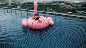 Outdoor pool, open 6 AM to 8 PM, pool umbrellas, pool loungers