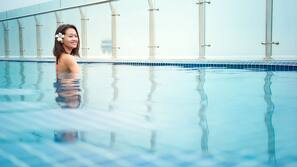 Outdoor pool, open 6 AM to 8 PM, pool umbrellas, pool loungers