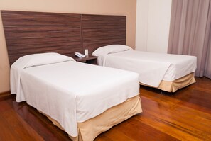 Double or Twin Room | Minibar, blackout drapes, iron/ironing board, free WiFi