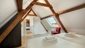 2 slaapkamers, een strijkplank/strijkijzer, gratis babybedden