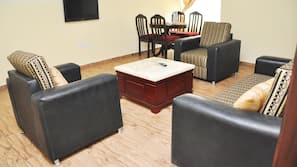 32-inch flat-screen TV with cable channels, TV
