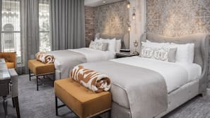 Ropa de cama de alta calidad, minibar, caja fuerte y escritorio