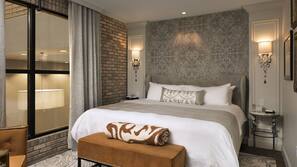 Ropa de cama de alta calidad, minibar, caja fuerte y escritorio