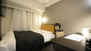 Down comforters, desk, free WiFi, bed sheets