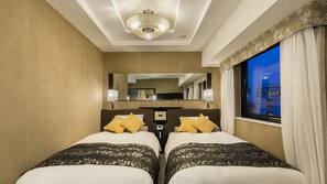 Down comforters, desk, free WiFi, bed sheets