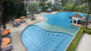Outdoor pool, pool umbrellas, sun loungers