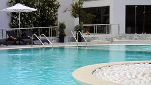 Outdoor pool, pool umbrellas, pool loungers
