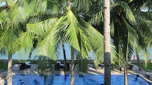Outdoor pool, pool umbrellas, sun loungers