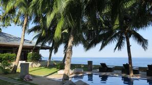 Outdoor pool, pool umbrellas, sun loungers