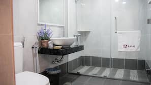 Shower, free toiletries, hair dryer, slippers