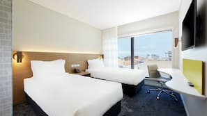Premium bedding, pillow top beds, in-room safe, desk