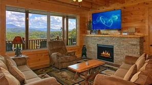 Flat-screen TV, fireplace, DVD player