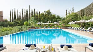 Indoor pool, outdoor pool, pool umbrellas, sun loungers