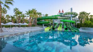 Indoor pool, outdoor pool, pool umbrellas, pool loungers