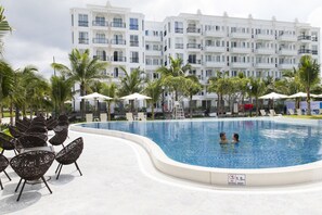 Outdoor pool, open 6 AM to 8 PM, pool umbrellas, sun loungers