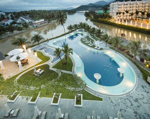 Outdoor pool, open 6 AM to 8 PM, pool umbrellas, sun loungers