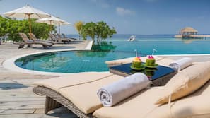 Outdoor pool, free cabanas, pool umbrellas