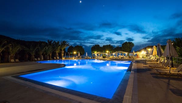 Seasonal outdoor pool, pool umbrellas, pool loungers