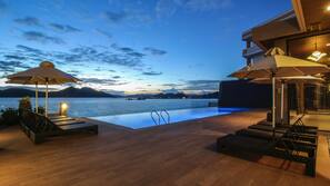 Outdoor pool, pool umbrellas, pool loungers