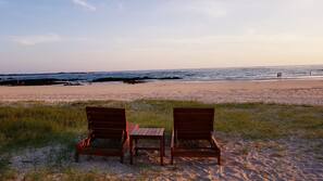 On the beach, white sand, beach shuttle, sun loungers
