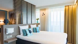 Een kluis op de kamer, een bureau, babybedden, extra bedden
