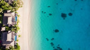 Private beach, white sand, sun loungers, beach towels
