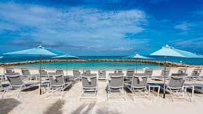 Private beach, white sand, sun-loungers, beach umbrellas