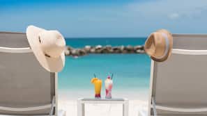 Private beach, white sand, sun-loungers, beach umbrellas