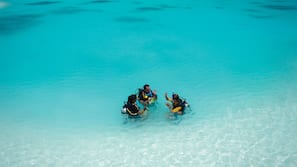 Private beach, white sand, free beach cabanas, sun loungers