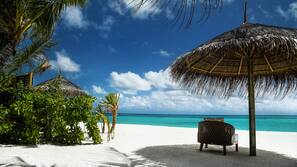 Private beach, white sand, free beach cabanas, sun-loungers