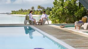 Outdoor pool, free cabanas, pool umbrellas