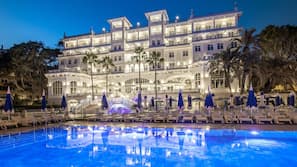 Seasonal outdoor pool, pool umbrellas, pool loungers