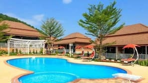 Outdoor pool, pool umbrellas, sun loungers