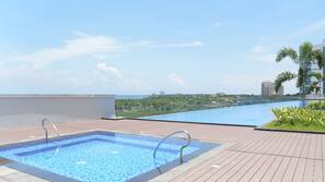 Outdoor pool, pool umbrellas, pool loungers