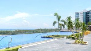 Outdoor pool, pool umbrellas, pool loungers